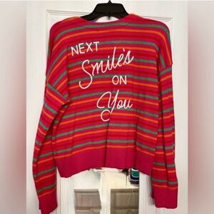 Kerri Rosenthal sweater is the "Next Smile's On You" style